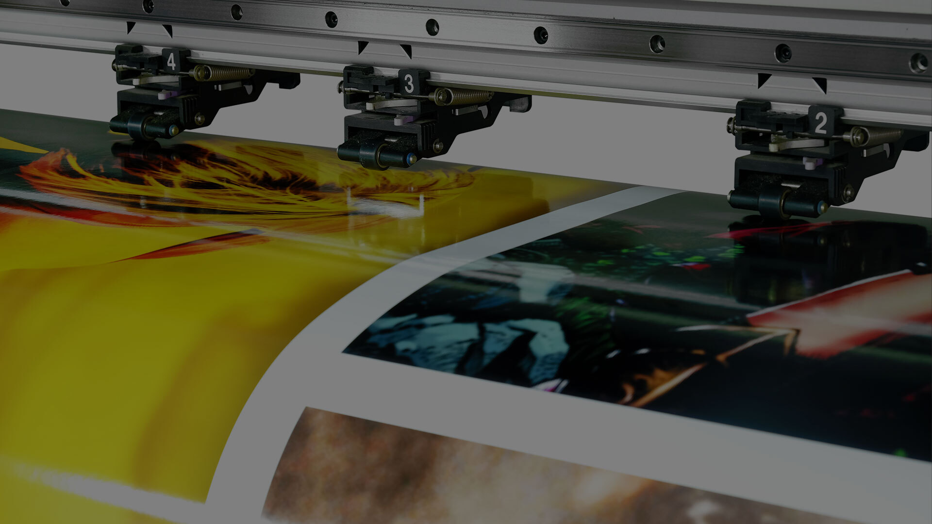 Print Marketing | Close up of machine printing images