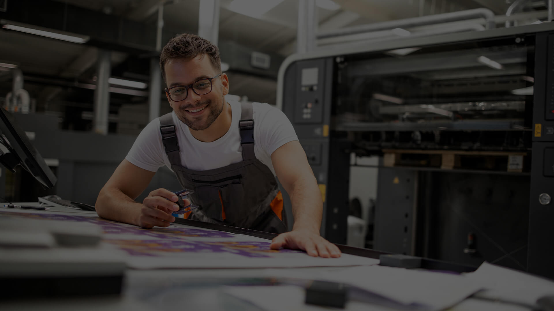 Man working in a printing warehouse