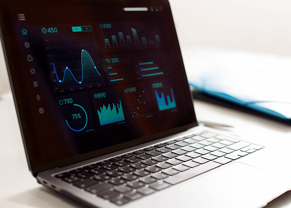 A laptop displaying various data analytics graphs and charts, illustrating the comparison of data science vs statistics in visual representation and data analysis.
